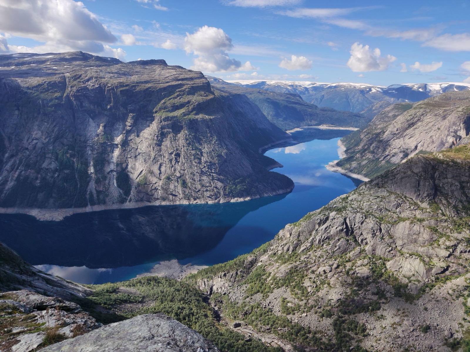 The long blue lake Ringedalsvatnet between steep mountain walls